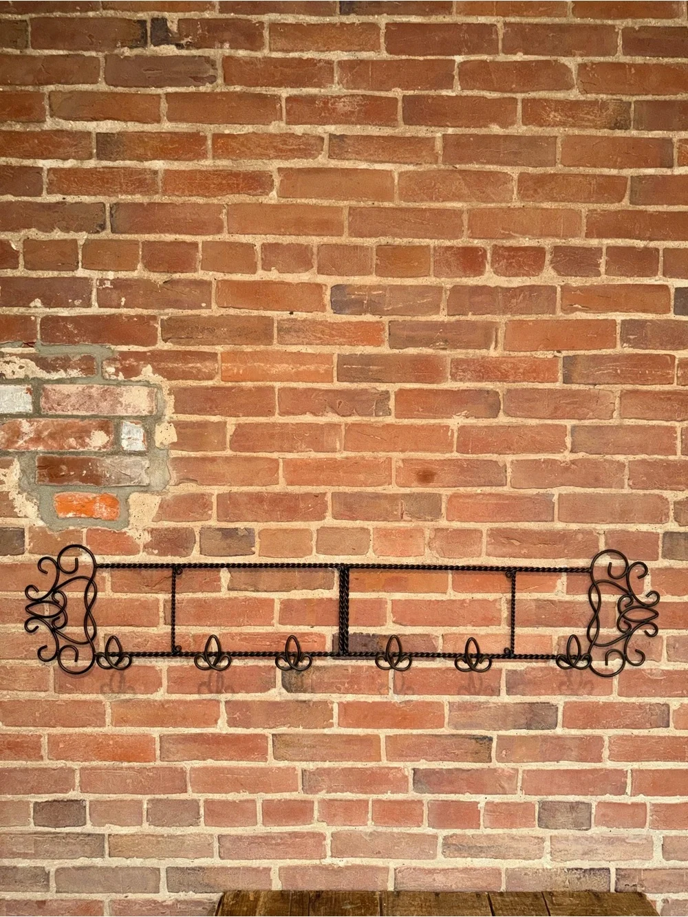 Ornate Black Metal Wall Hook Rack with Scroll Accents